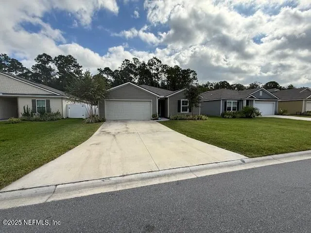 front view of house with a yard