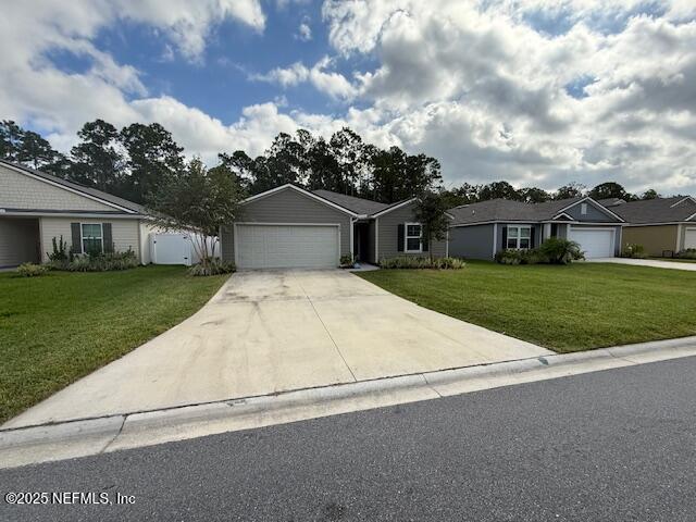 828 Morgans Treasure Road St. Augustine, FL 32084 - Photo 17 of 21 front view of house with a yard