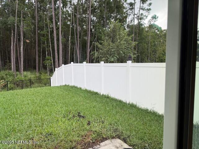 828 Morgans Treasure Road St. Augustine, FL 32084 - Photo 10 of 21 a view of a backyard