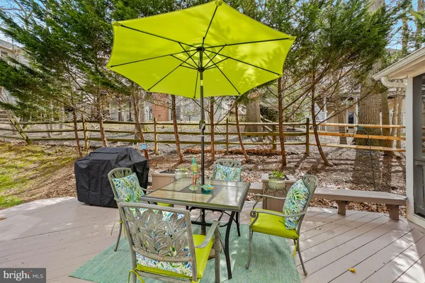 a view of a chairs and table in the patio