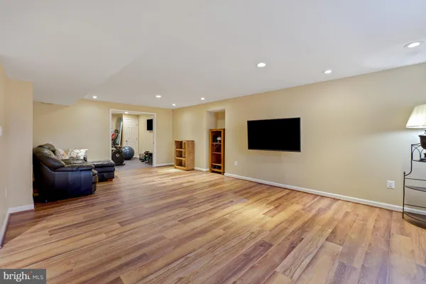 a view of a livingroom with wooden floor