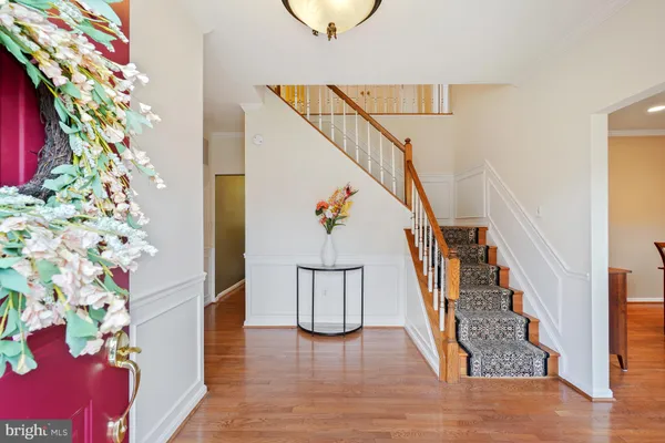 a view of entryway with wooden floor