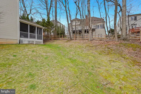 a view of a house with brick walls