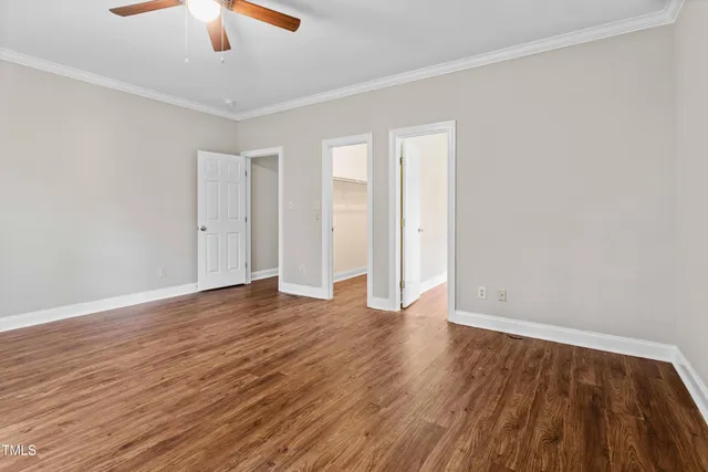 a bathroom with a bathtub and a toilet