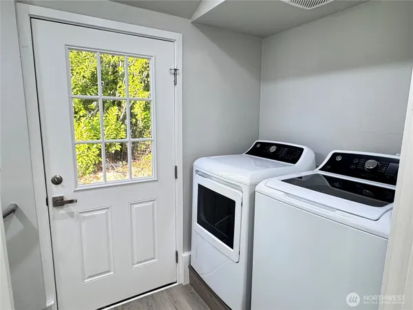 a utility room with dryer and washer