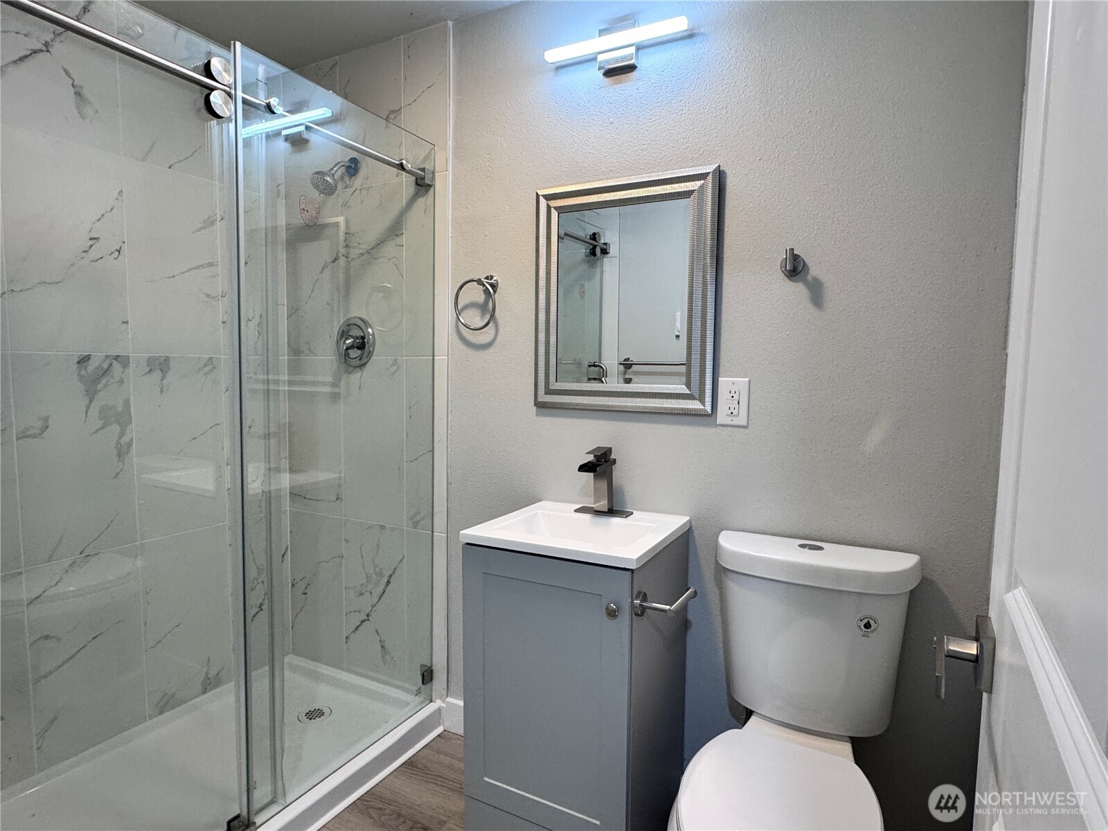 213 Willow Street Bremerton, WA 98310 - Photo 25 of 29 a bathroom with a toilet sink and shower