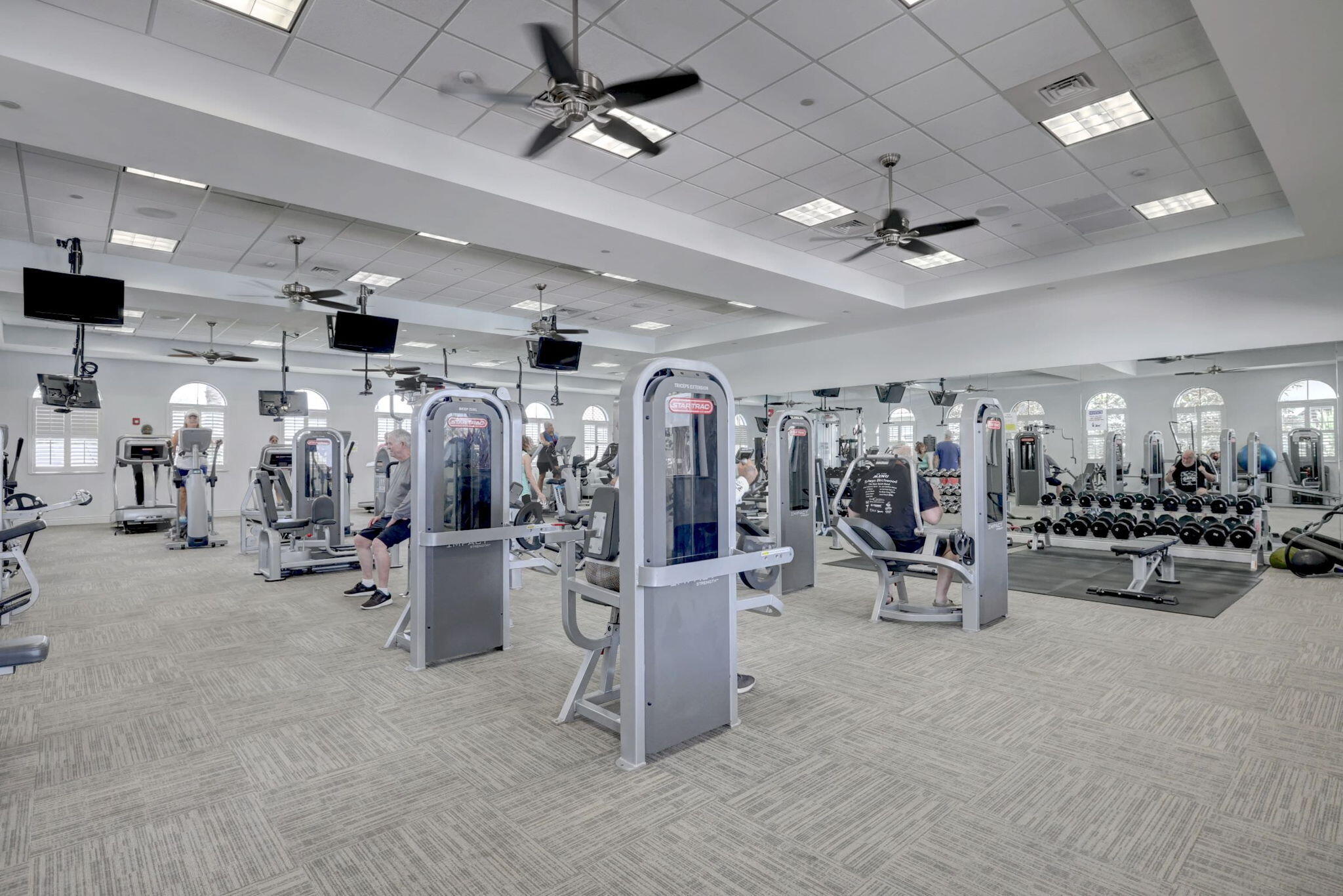 10619 Southwest Capraia Way Port St. Lucie, FL 34986 - Photo 74 of 90 a view of a room with gym equipment
