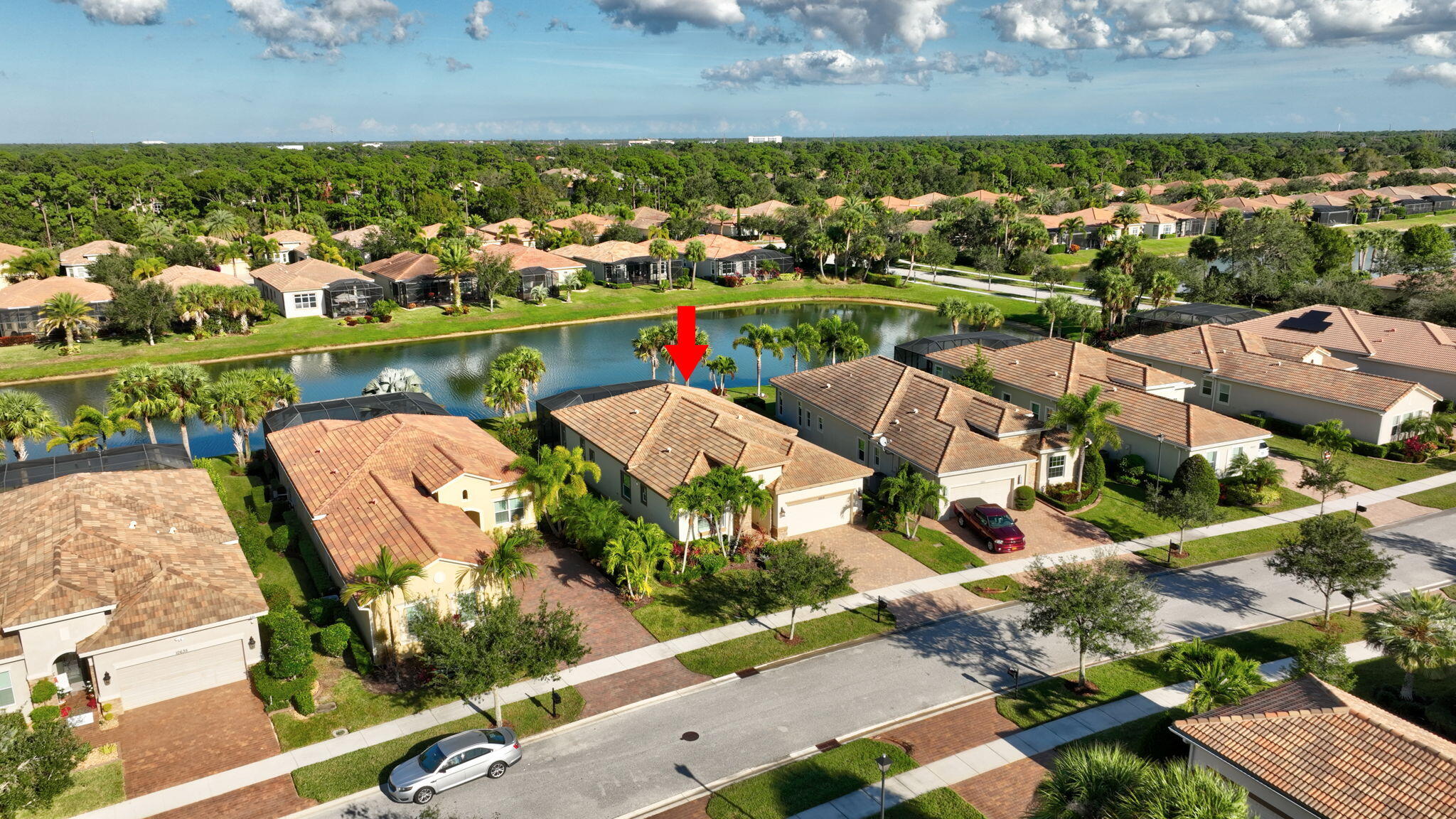 10619 Southwest Capraia Way Port St. Lucie, FL 34986 - Photo 82 of 90 an aerial view of lake residential houses with outdoor space
