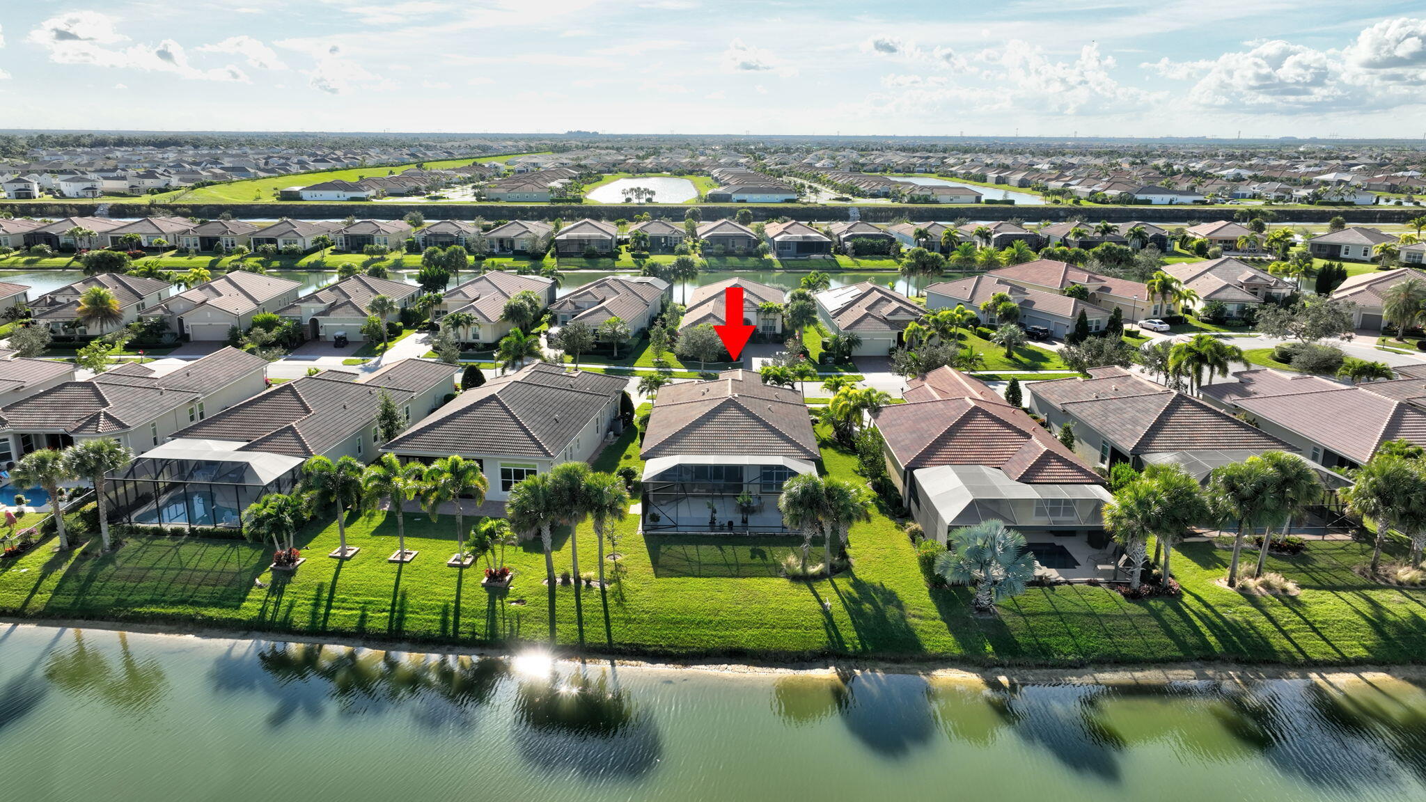 10619 Southwest Capraia Way Port St. Lucie, FL 34986 - Photo 85 of 90 an aerial view of residential houses with outdoor space and river