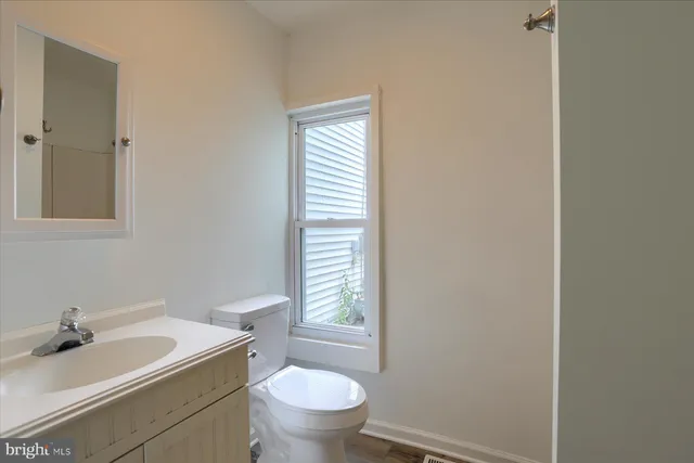 a bathroom with a sink and a toilet