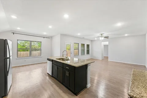 a view of backyard with pathway