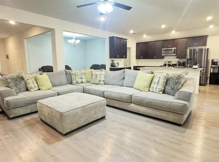 a living room with furniture and a couch