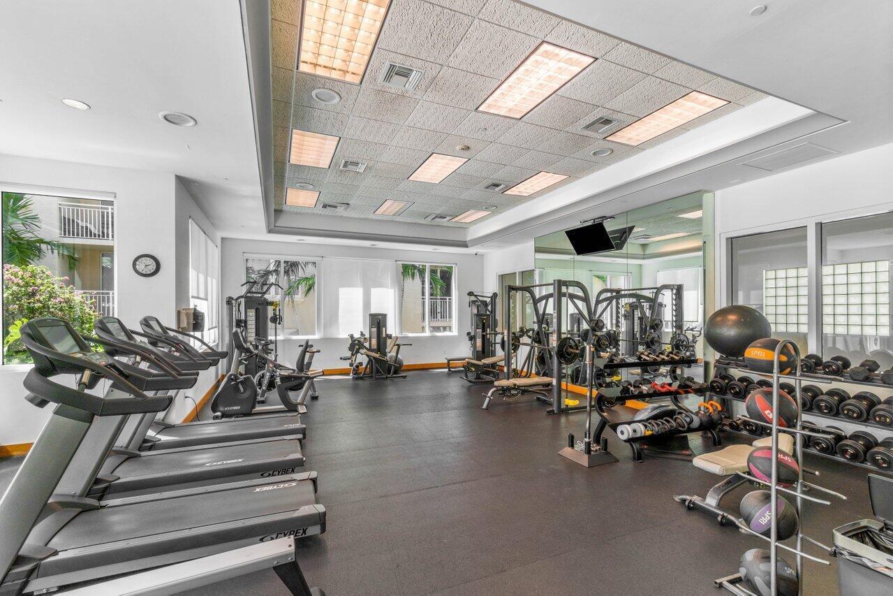99 Southeast Mizner Boulevard, Unit 648 Boca Raton, FL 33432 - Photo 15 of 19 a view of a room with gym equipment