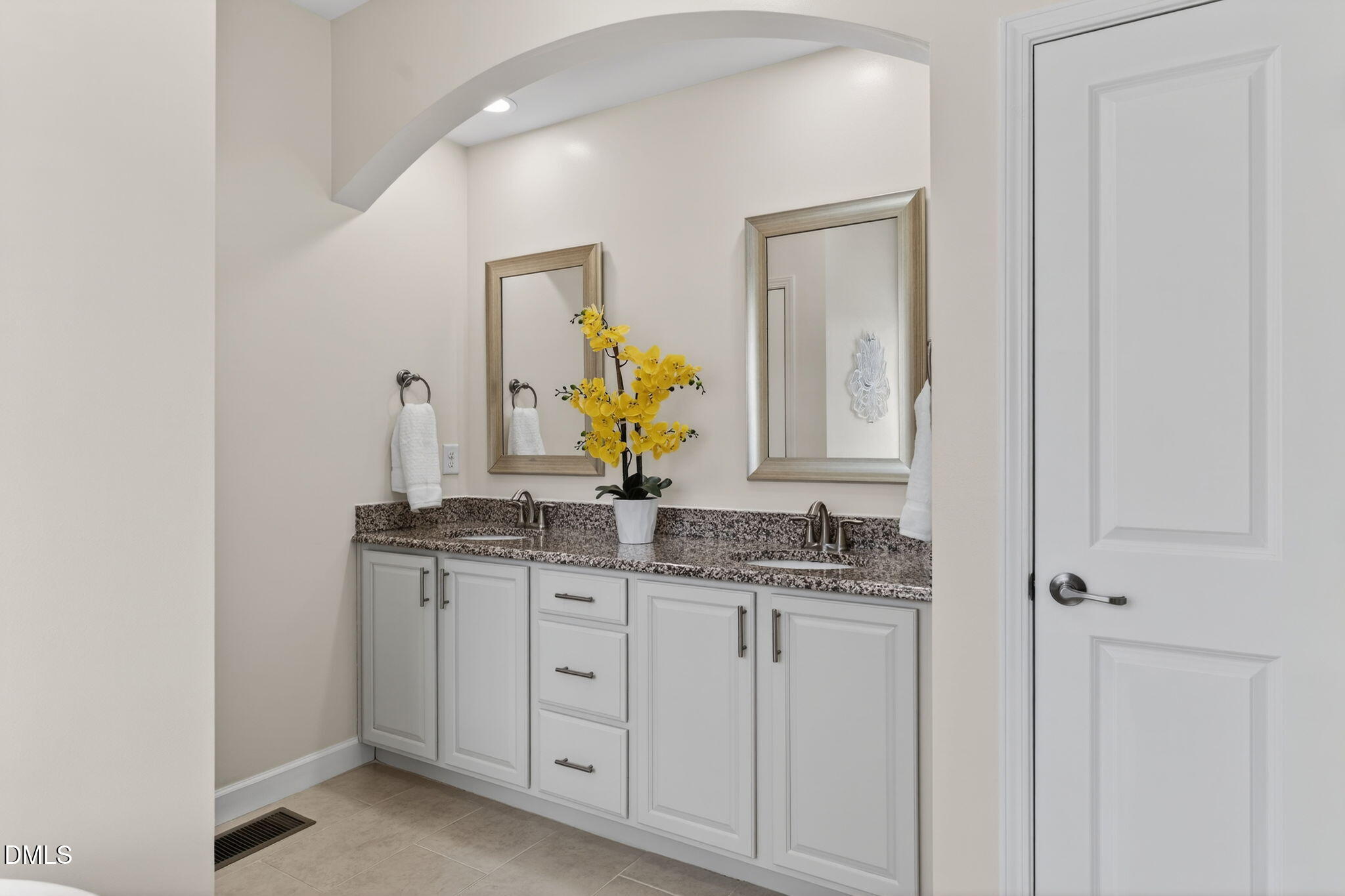 4033 Robious Court Cary, NC 27519 - Photo 26 of 58 a bathroom with a granite countertop sink and a mirror