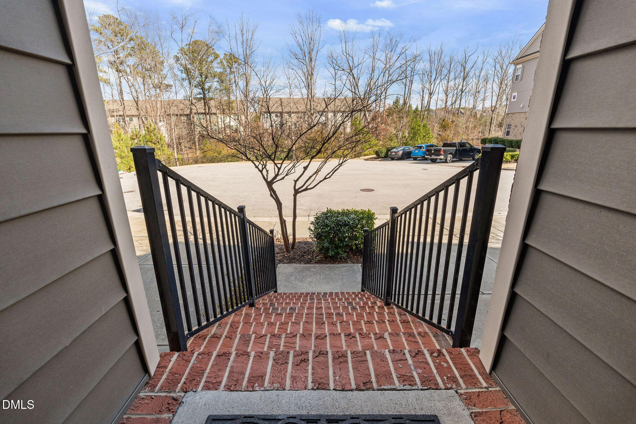 4033 Robious Court Cary, NC 27519 - Photo 5 of 58 a view of balcony with wooden floor