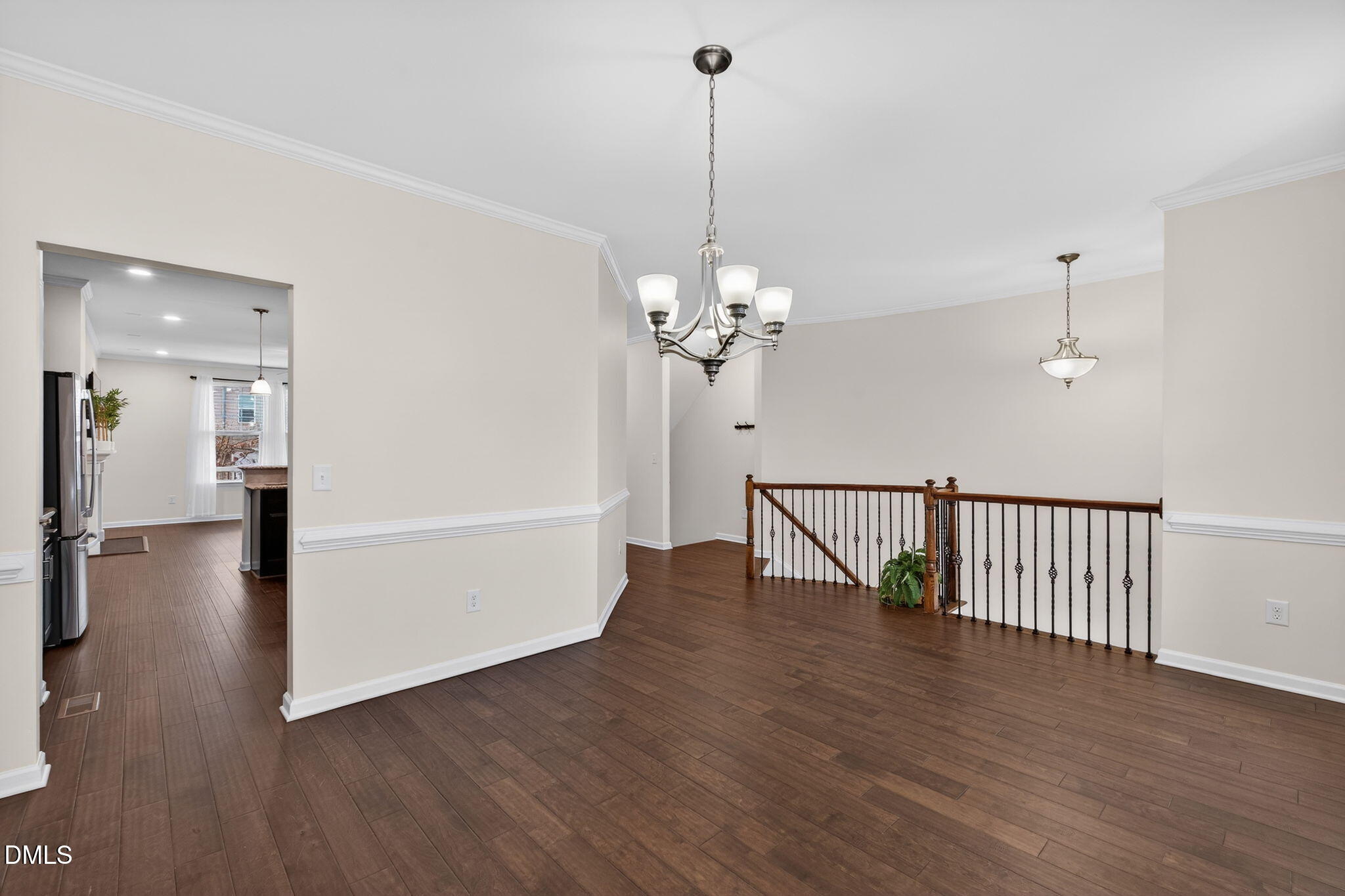 4033 Robious Court Cary, NC 27519 - Photo 7 of 58 a view of a livingroom with wooden floor
