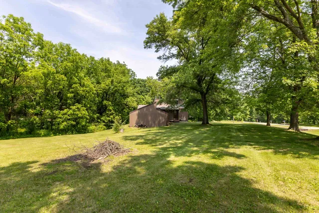 a fire hydrant in the middle of a field