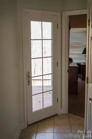 a livingroom with workspace and a window