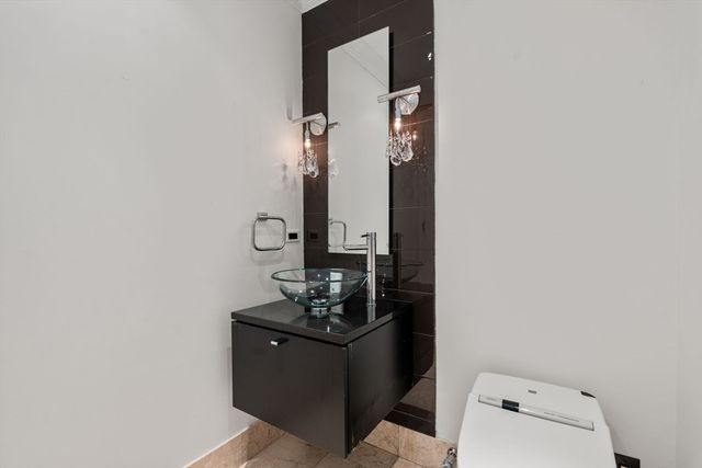 a room with a table and flowerpot