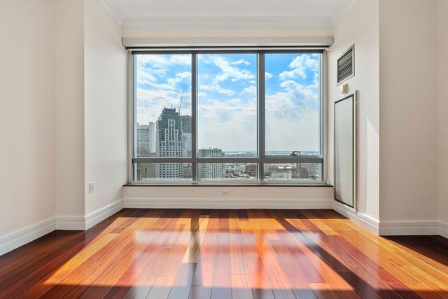 a view of a room with a large window