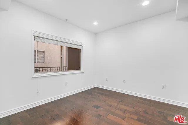 a view of a bathroom with a glass door