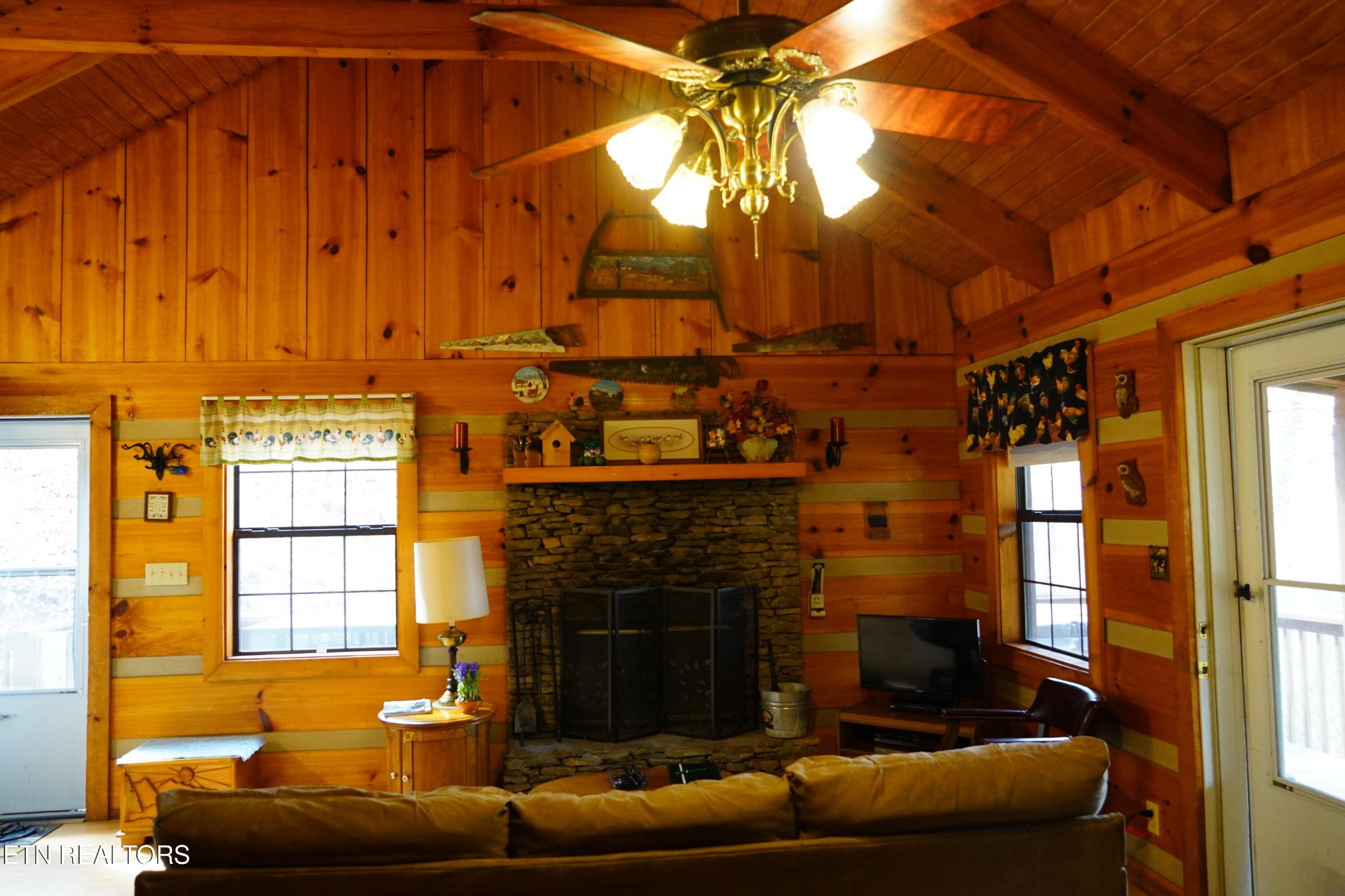 994 Emilyville Way Cosby, TN 37722 - Photo 10 of 24 a living room with furniture and a fireplace