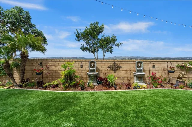 a view of a parking space with a big yard