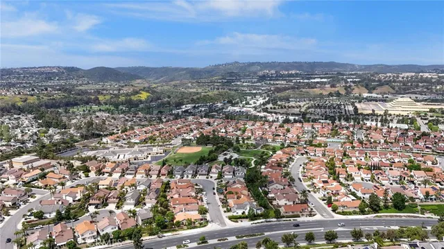 an aerial view of a city with lots of residential buildings