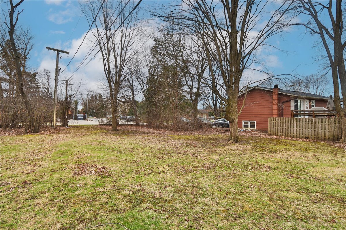 0 Prague Avenue Buffalo Grove, IL 60089 - Photo 2 of 6 a backyard of house with large trees