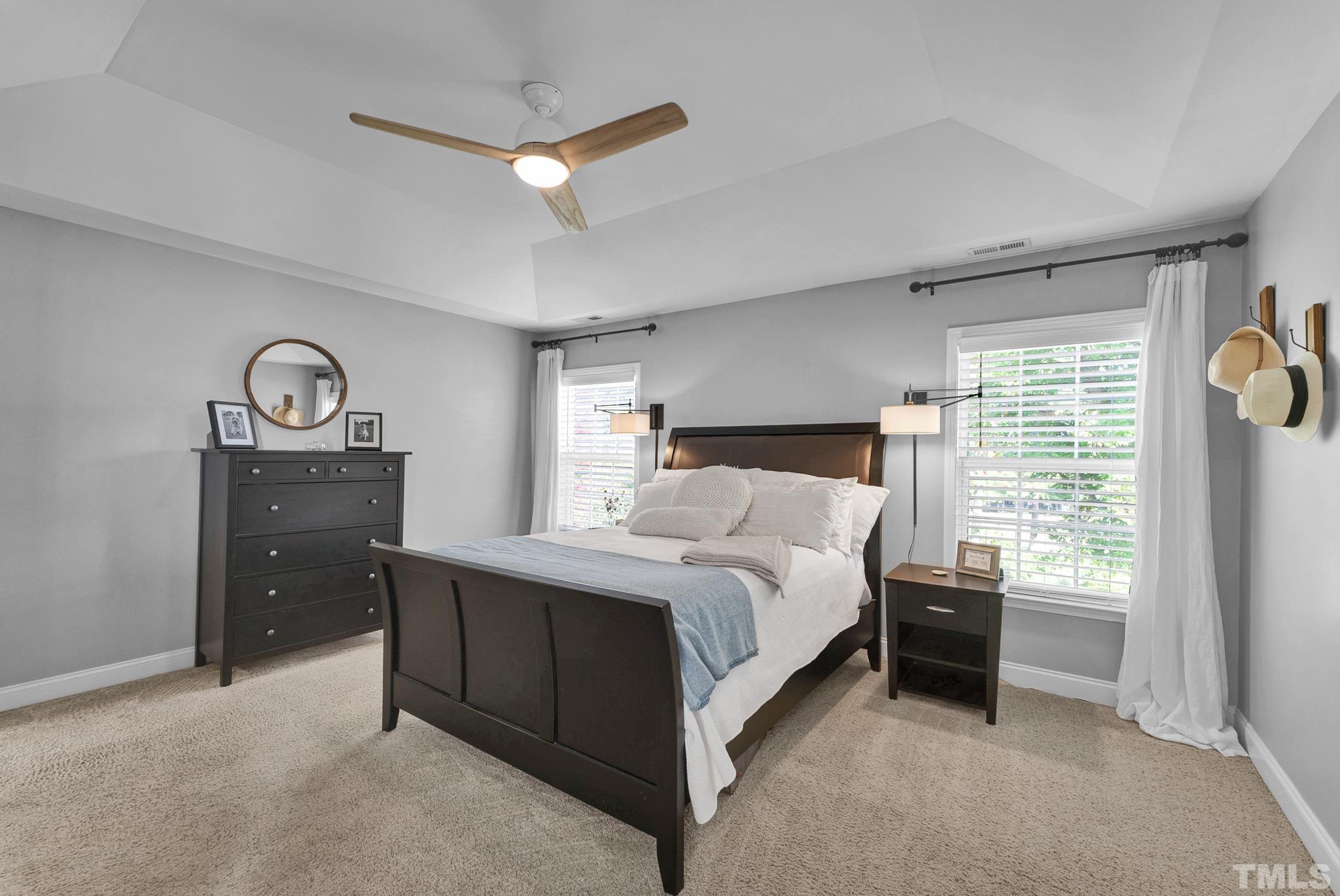 161 Ryder Cup Circle Raleigh, NC 27603 - Photo 14 of 31 a bedroom with a bed and a window