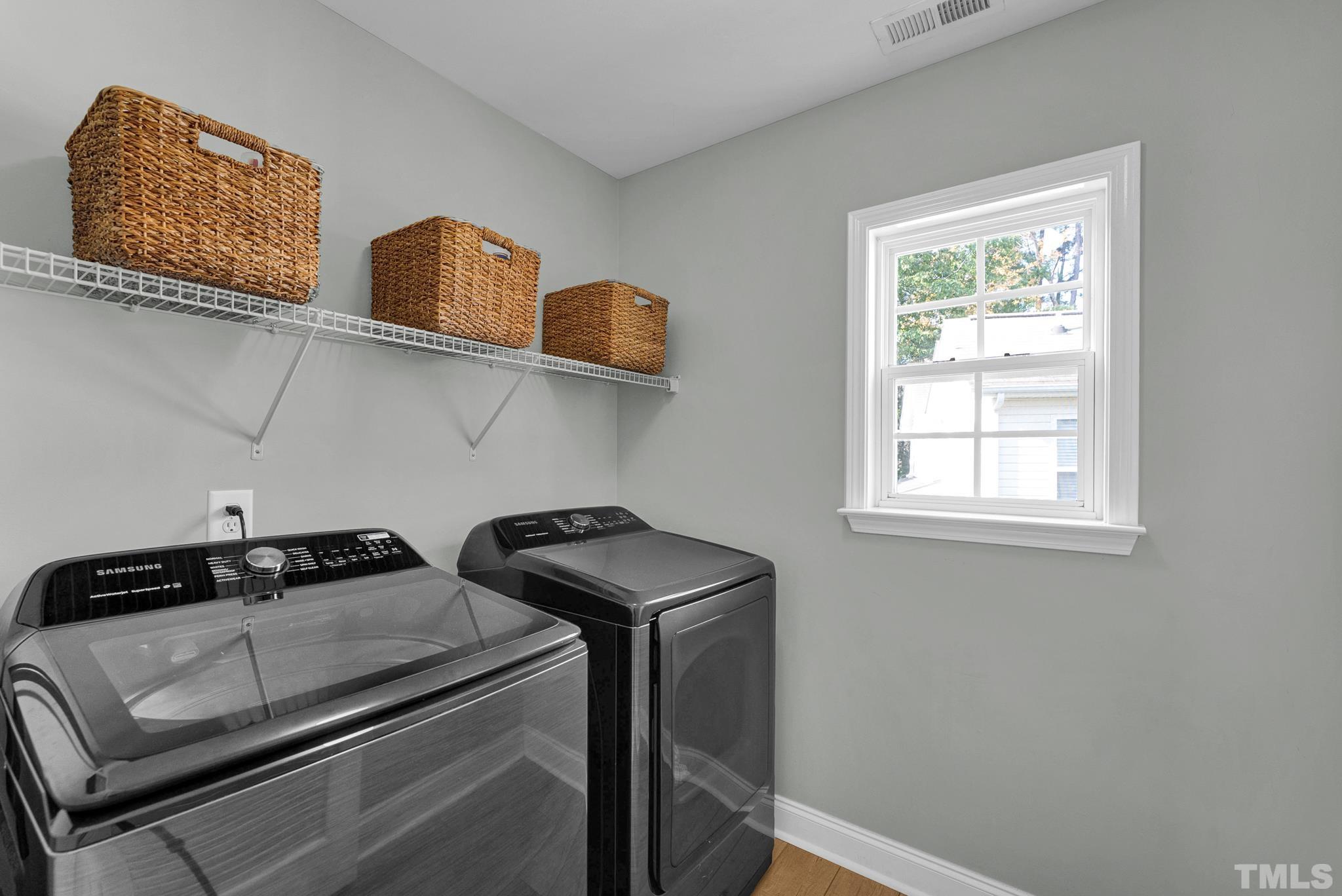 161 Ryder Cup Circle Raleigh, NC 27603 - Photo 21 of 31 a close view of sink washer and dryer