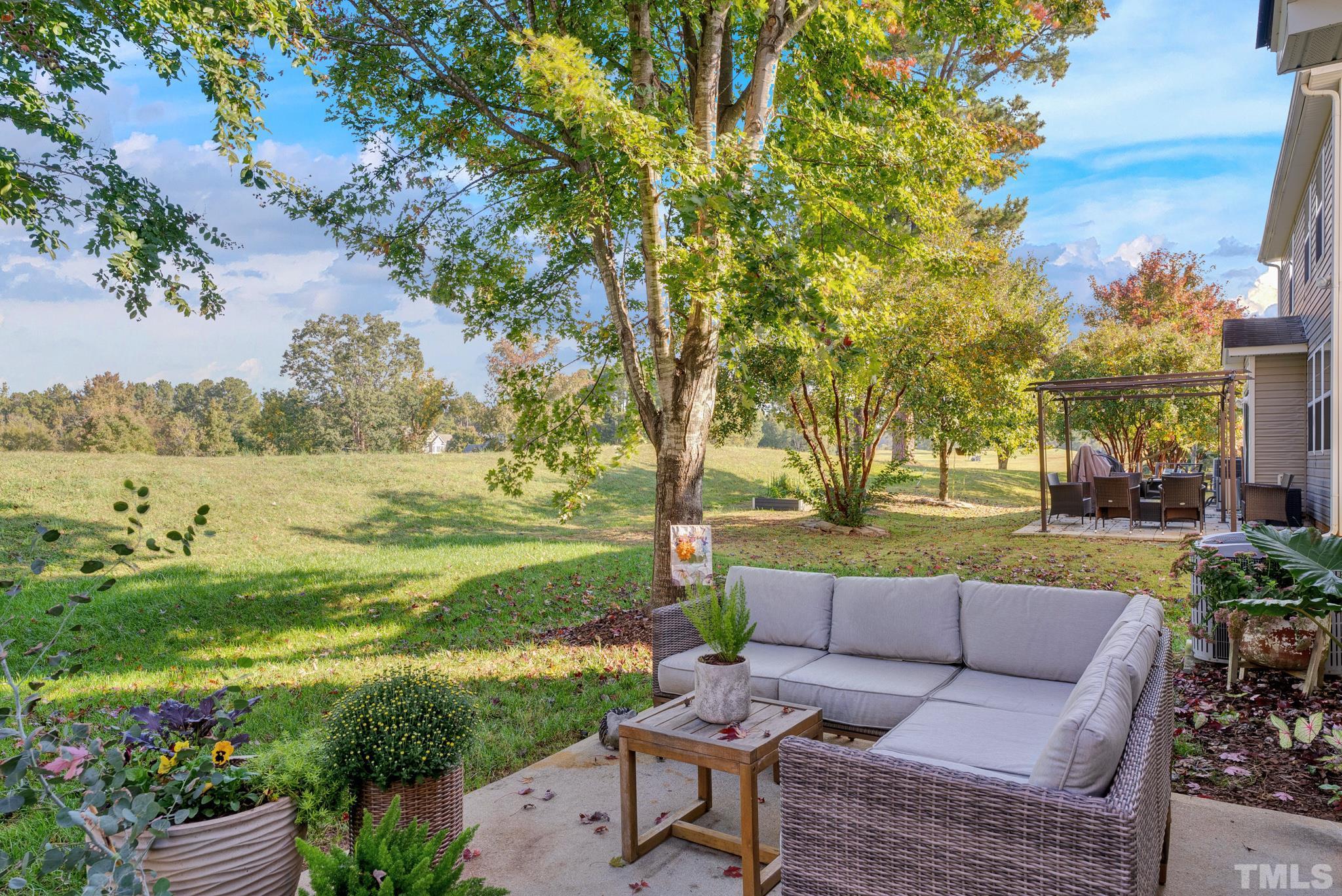 161 Ryder Cup Circle Raleigh, NC 27603 - Photo 22 of 31 a view of a garden with furniture