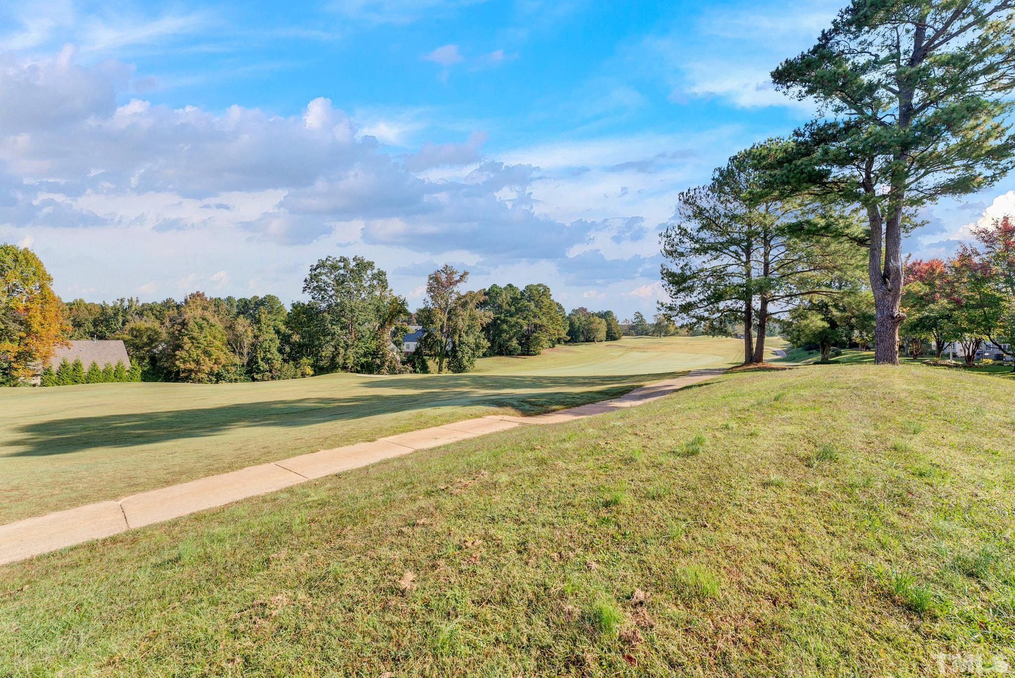 161 Ryder Cup Circle Raleigh, NC 27603 - Photo 25 of 31 a view of lake view with trees