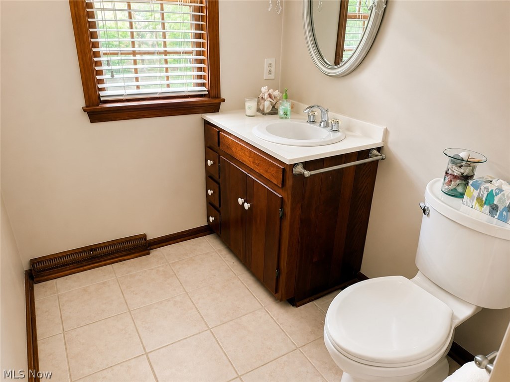 6155 Gibson Road Canfield, OH 44406 - Photo 33 of 43 Bathroom featuring a wood vanity with a white countertop and integrated sink