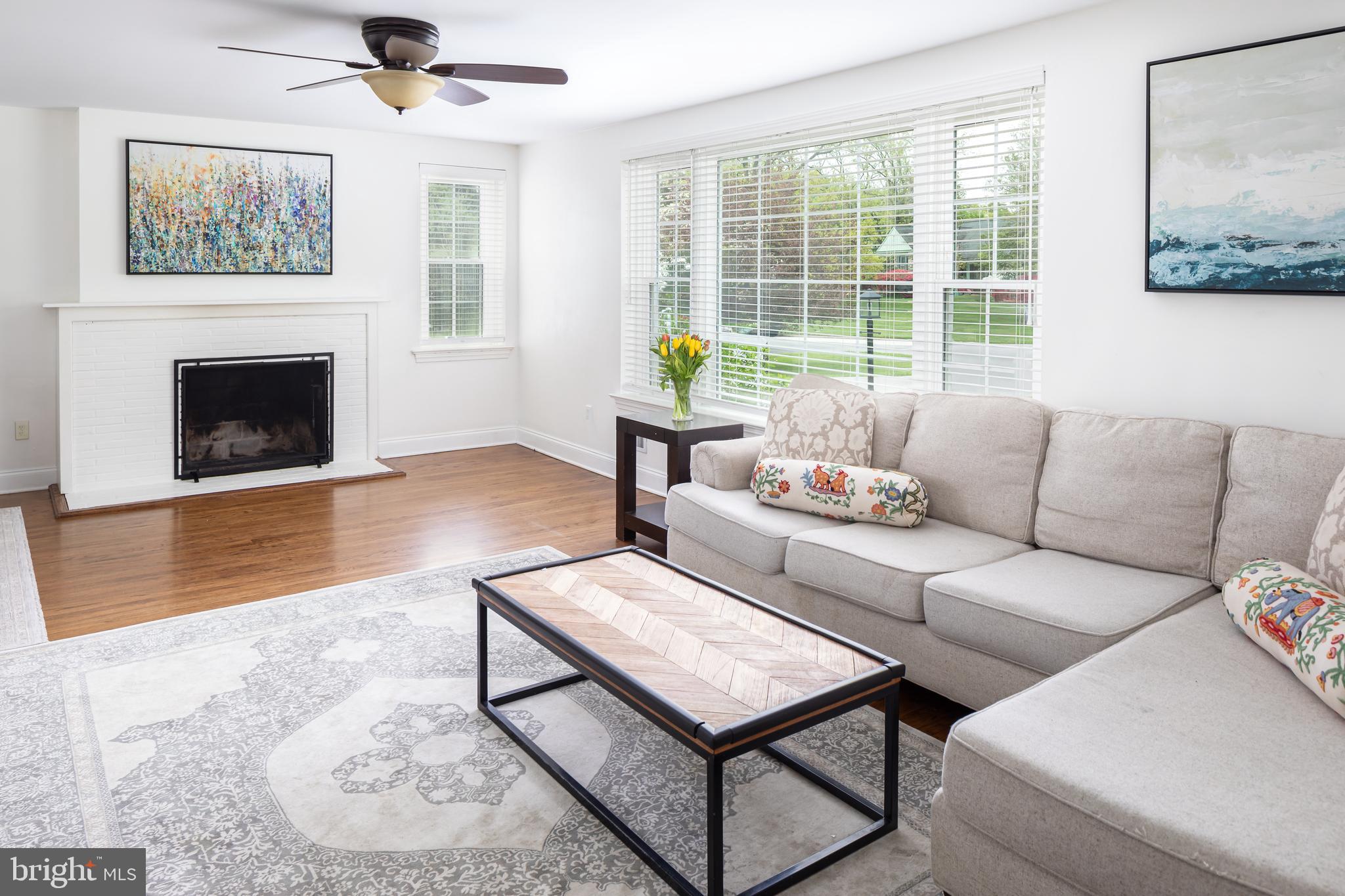 117 Hillside Road Wayne, PA 19087 - Photo 5 of 36 Living Room Framed by Fireplace and Triple Window