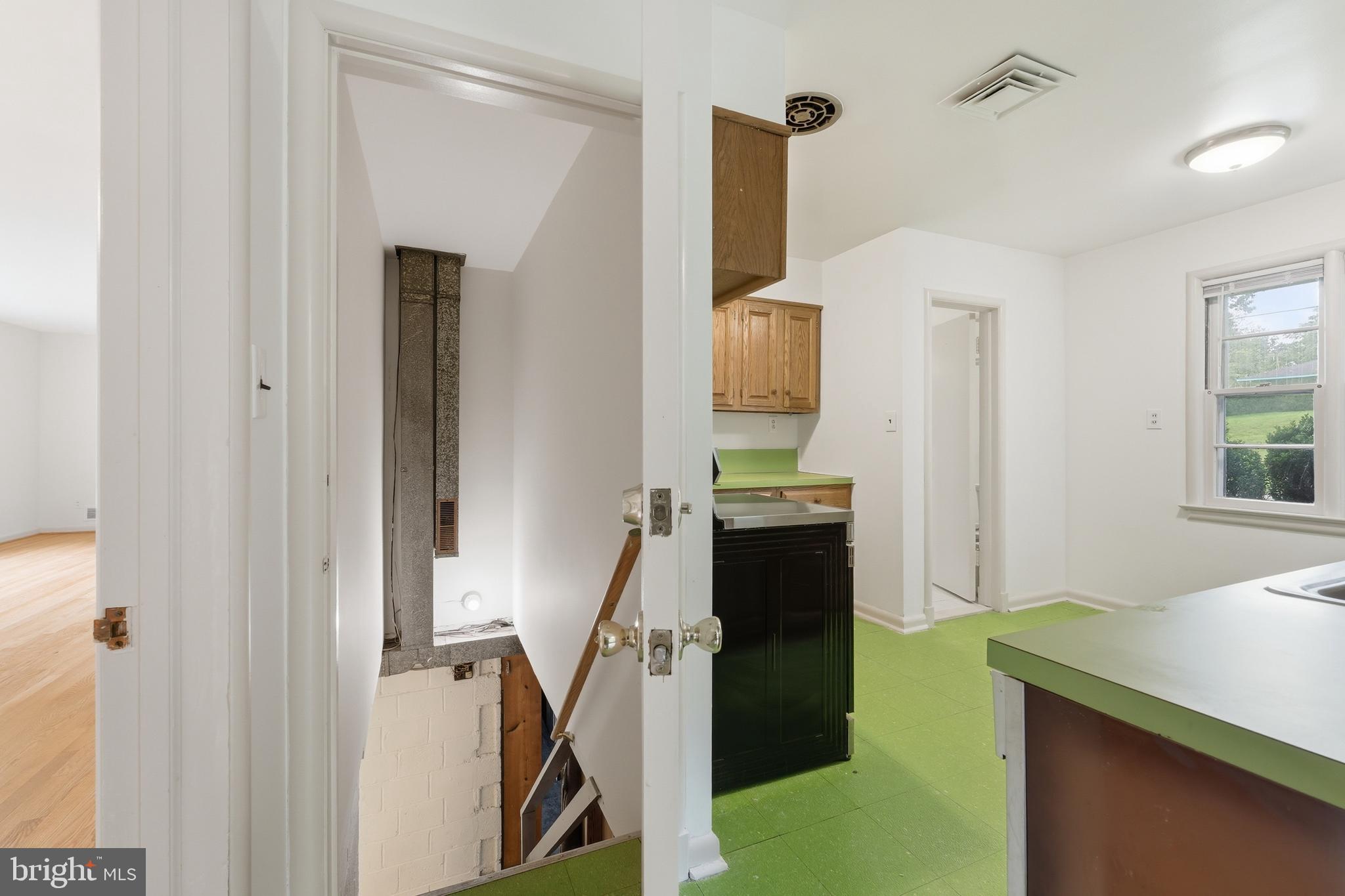 228 Northwest Terrace Silver Spring, MD 20901 - Photo 40 of 70 a view of a kitchen with furniture and a window