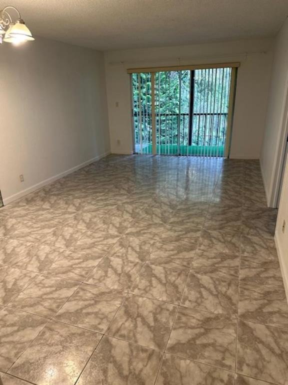 7831 North Colony Circle, Unit 203 Tamarac, FL 33321 - Photo 4 of 13 a view of room with window