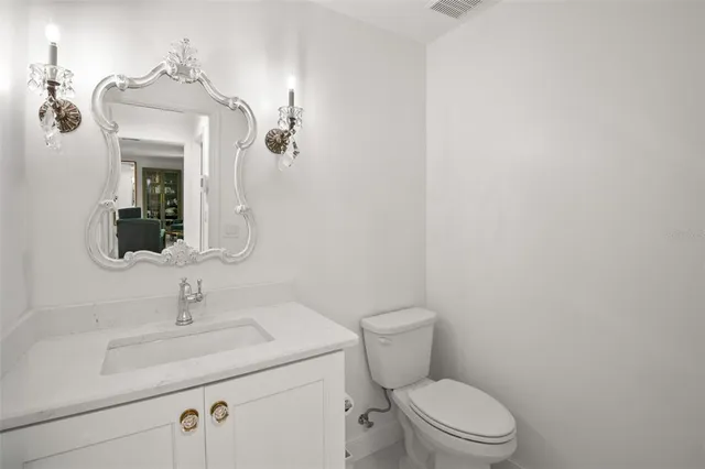 a living room with furniture fireplace and a flat screen tv