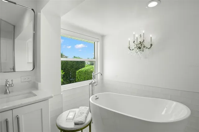 a bathroom with a shower toilet and sink