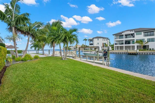 a view of swimming pool and outdoor seating
