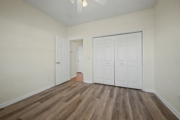 a view of room with hardwood floor