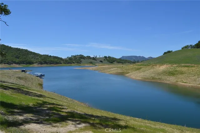 a view of a lake with a mountain in the background