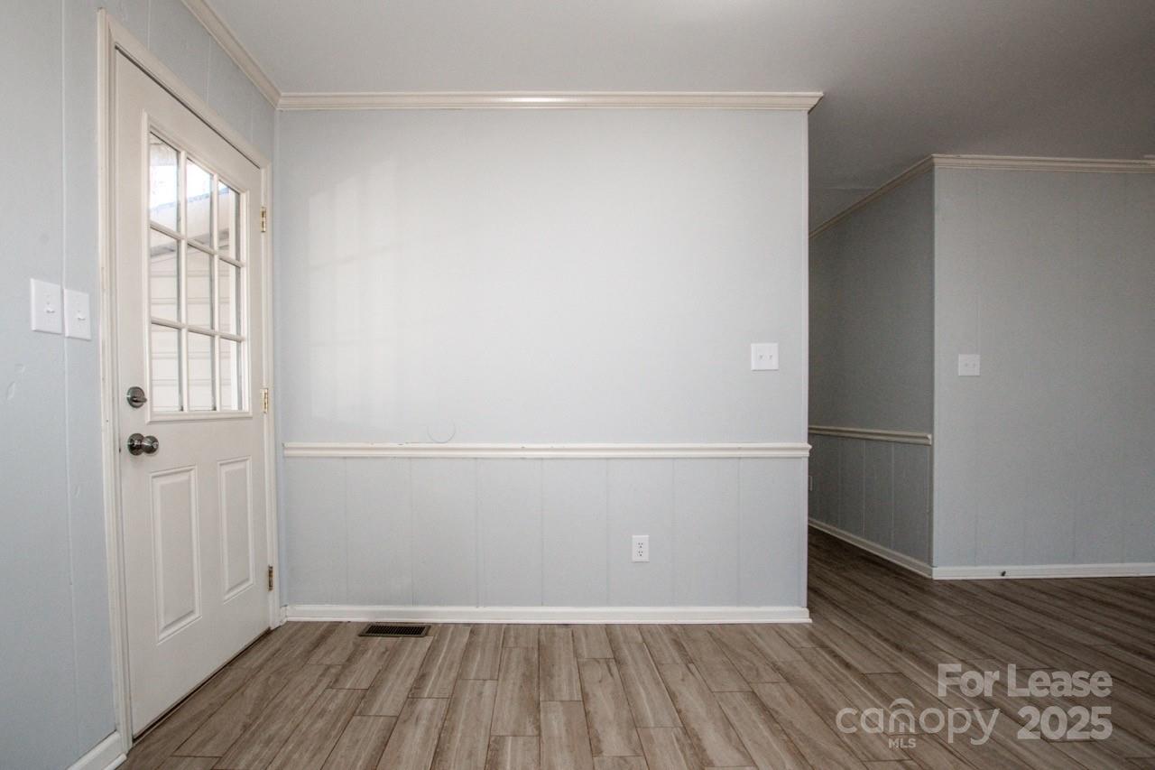 1159 Camp Creek Road Iron Station, NC 28080 - Photo 20 of 48 a view of a room with wooden floor
