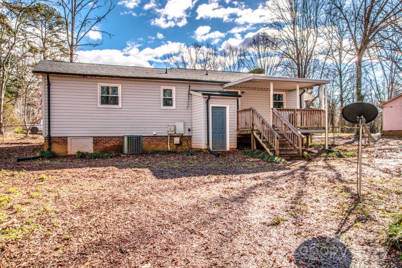 1159 Camp Creek Road Iron Station, NC 28080 - Photo 42 of 48 a front view of a house with garden