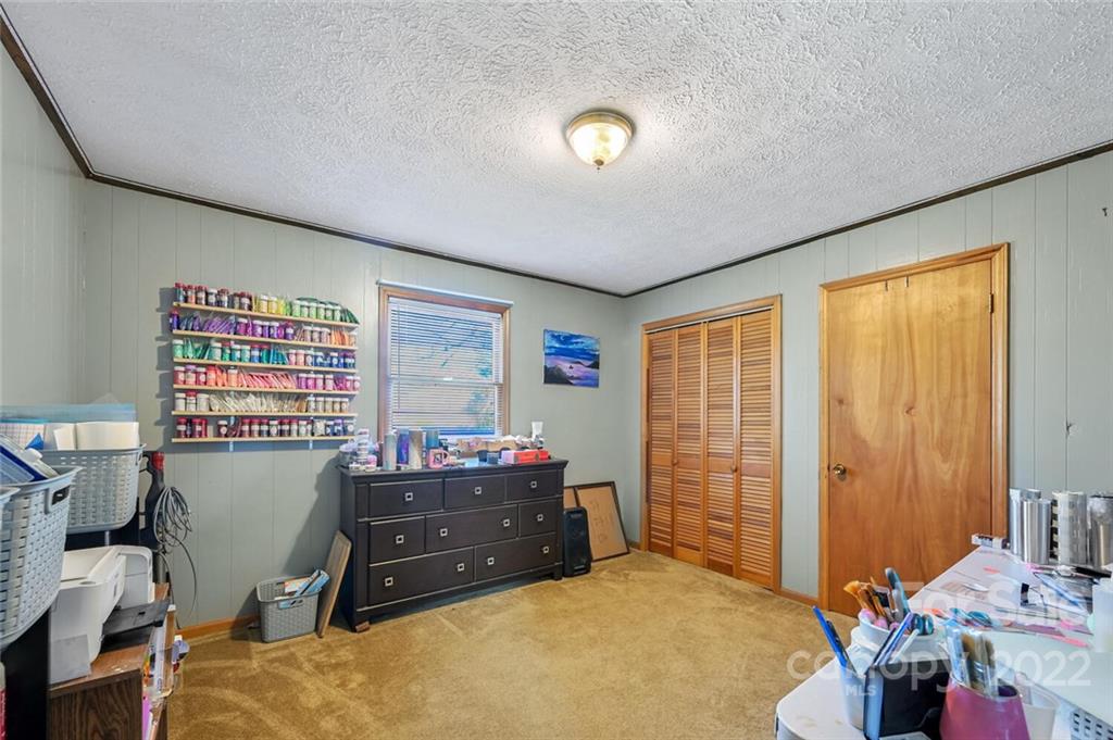 685 Kims Cove Road Canton, NC 28716 - Photo 21 of 43 a room with furniture and a window