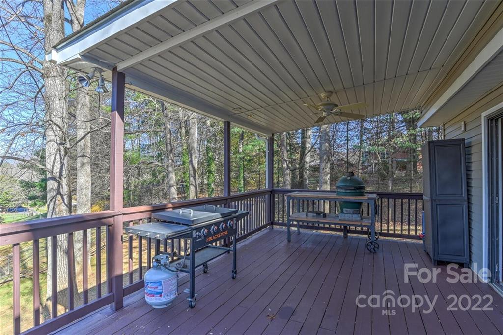 685 Kims Cove Road Canton, NC 28716 - Photo 35 of 43 a view of a two chairs on the deck