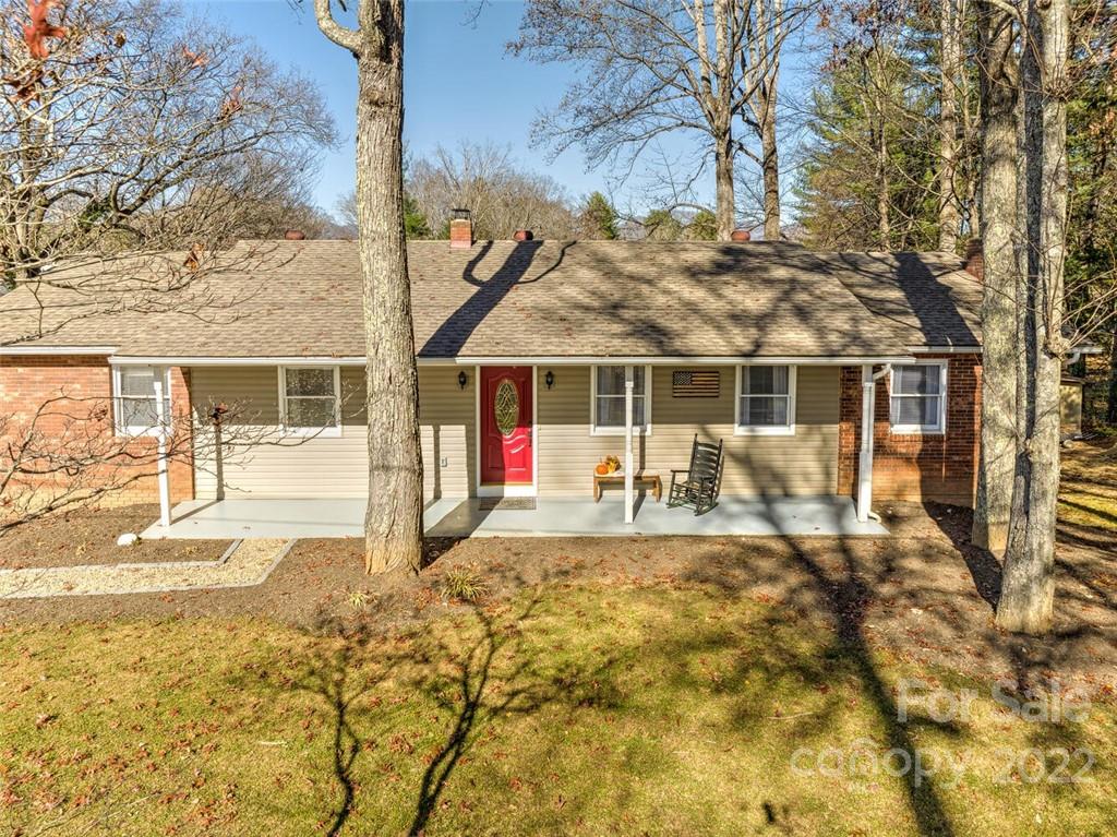 685 Kims Cove Road Canton, NC 28716 - Photo 39 of 43 front view of a house with a patio