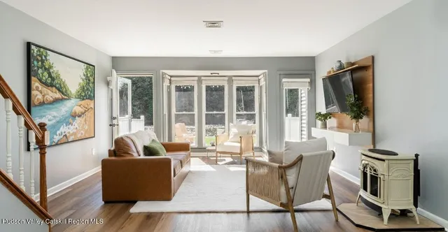 a view of living room with deck and furniture