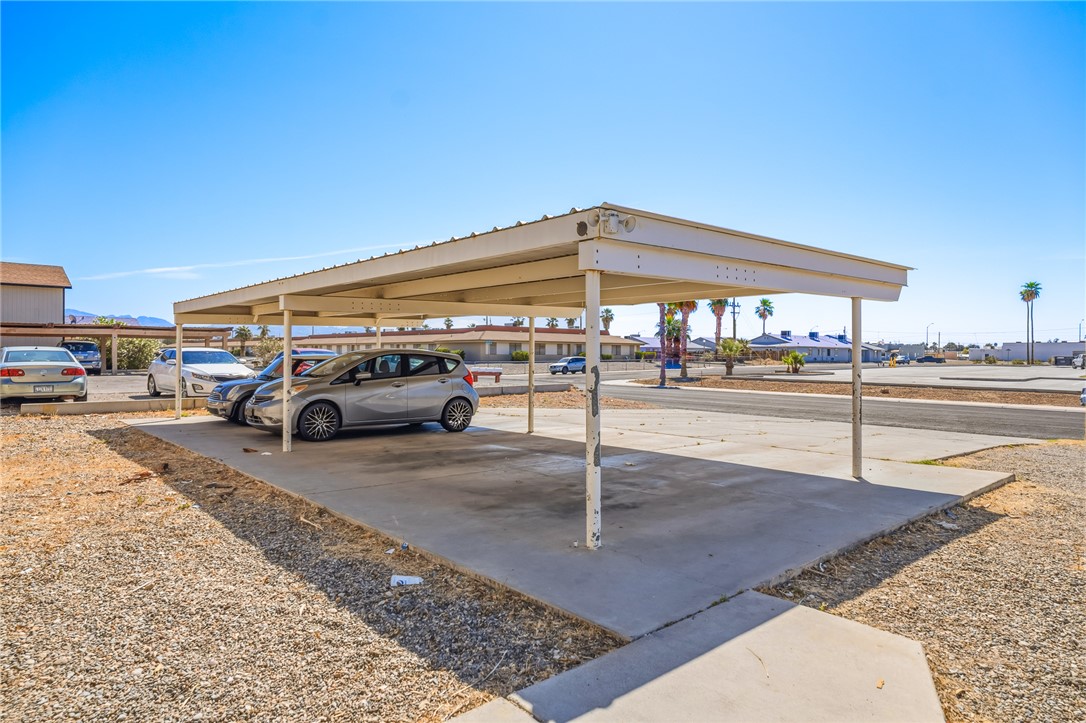 793 Baseline Road Bullhead City, AZ 86442 - Photo 34 of 49 Covered parking structure with a concrete slab base and metal framing