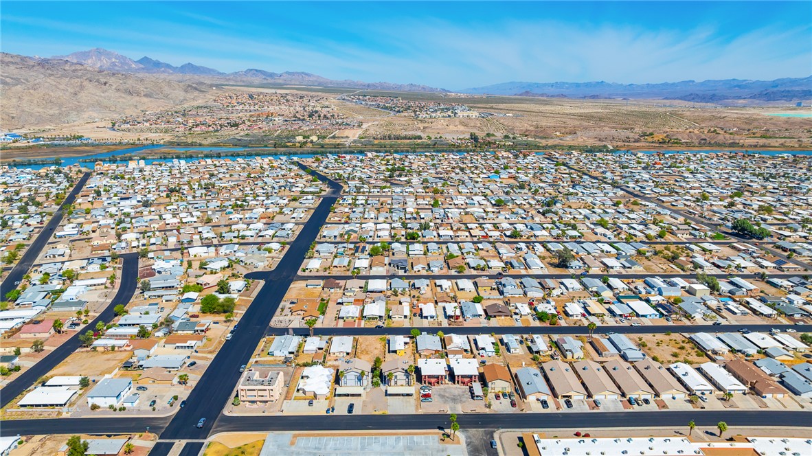 793 Baseline Road Bullhead City, AZ 86442 - Photo 35 of 49 Expansive aerial perspective showcasing a residential community with a consistent grid street pattern